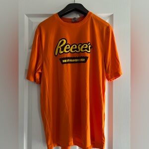 Reese’s orange t-shirt. EUC